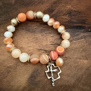 Gold and Orange Beaded Bracelet with Cross Charm